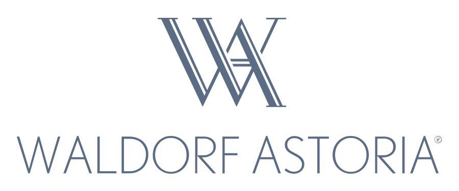 A green background with the words waldorf astor in blue.