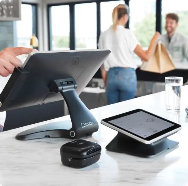 img-toast-demo-form A tablet computer sitting on top of a counter.