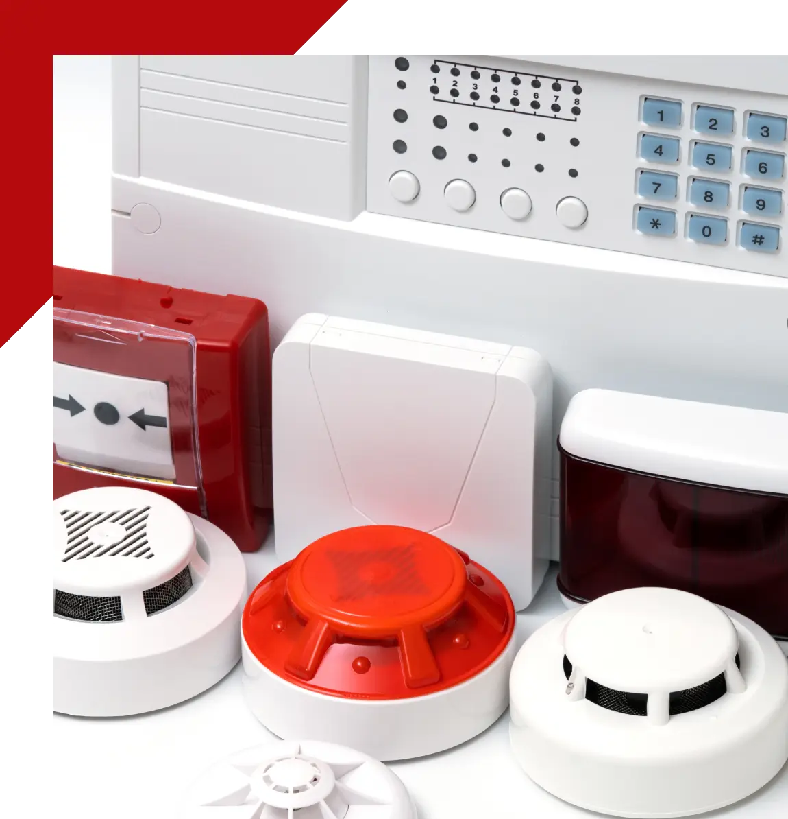 Group 34 A group of fire detectors sitting on top of a table.