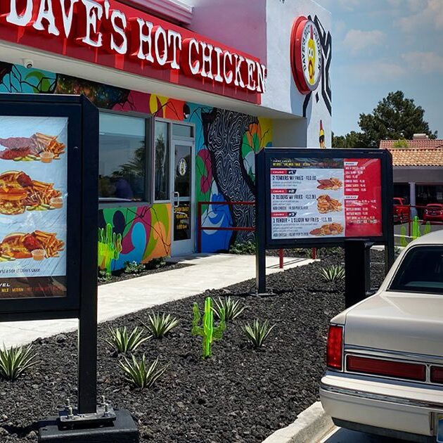 dsa-signage-food-and-beverage-daves-hot-ckicken-slider-1 (1) A car parked in front of a fast food restaurant.