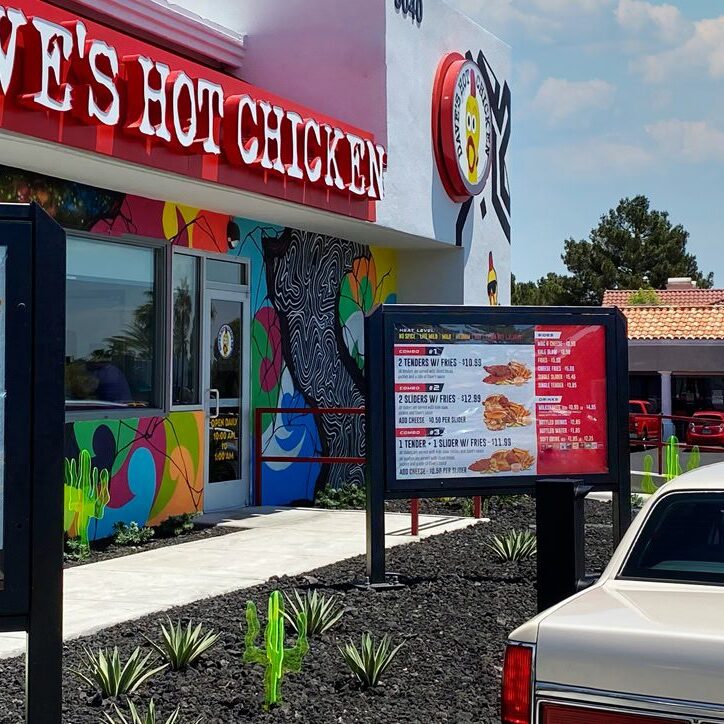 dsa-signage-food-and-beverage-daves-hot-ckicken-slider-1 A drive thru sign in front of a restaurant.