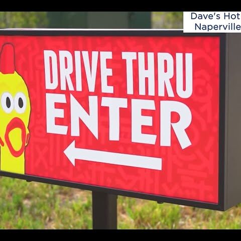 sddefault A sign that says drive thru enter with an image of a chicken.